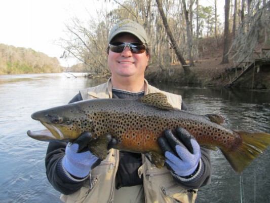 The guide said it was the biggest brown he had seen taken on the river.
